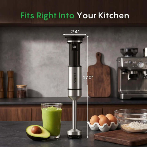 Powerful Immersion Hand Blender With Trigger Variable Speed For Precise Blending next to a green smoothie and eggs on a kitchen counter.