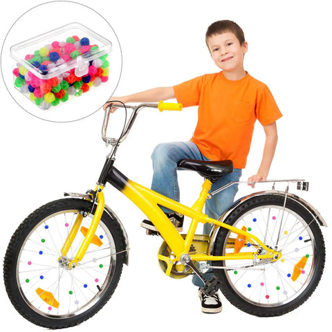 Boy on bike with 216 Piece Bicycle Spoke Beads Kit With Assorted Color Plastic Clip Beads for Wheel Decoration and storage box