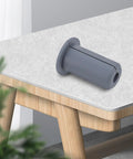 Get This KJHBV Silicone Cable Grommet Protector Set For Wall Routing To Keep Wiring Neat And Protected Against Wear, Heat, And Damage With Easy Install In Home Or Office. Grey silicone cable grommet on desk edge