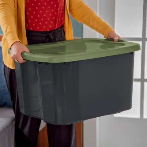 Heavy Duty 17.5 Gallon Plastic Storage Bin With Clear Lid And Full Length Through Wall Handles Gray Opaque Base, being lifted.