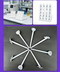 Mobile Laboratory Drying Rack With Detachable Drip Rod For Lab Glassware, displayed with pegs on laboratory countertop.