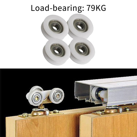 Four Pc U Groove Pom Pulleys With Eight mm Bore And 34 mm Outer Diameter showing four white POM wheels designed for smooth sliding.