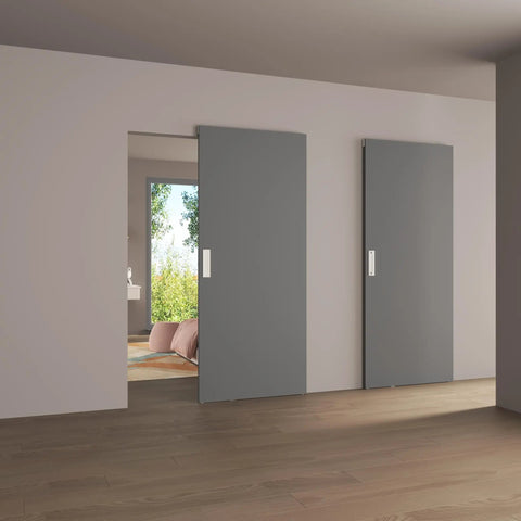 30X84 Inch Flush White Primed Barn Door With Invisible Hidden Track And Soft Close Hardware Kit shown in modern interior setting.