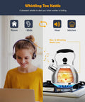 Stainless Steel 2 Quart Whistling Tea Kettle For Stovetop With Ergonomic Folding Handle on gas stove, loud whistle, silver design.