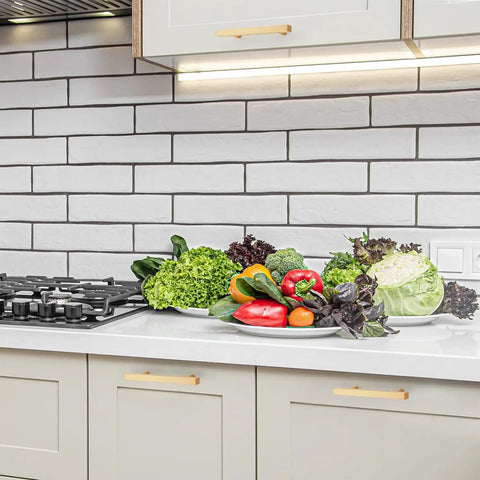 Top Shelf Champagne Gold Square Cabinet Handles For Modern Kitchen Drawers Hella Strong Heavy Duty Metal Construction With Ultra Smooth Finish And Quick Install 4 Inch Spread beside fresh vegetables on a countertop.