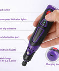 Tough As Nails Multi Speed Mini Electric Angle Grinder With 82 Piece Bit Set showing user hand holding tool with controls and ports.