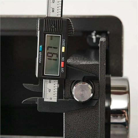 Close-up of Electronic Lock Safe For Documents And Valuables Heavy Duty Strong Box with metal thickness measurement.