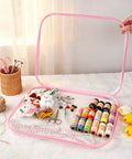 Rock Solid Clear Hard Shell Zippered Storage Cases With Name Tags 3 Pack holding sewing supplies in pink totes.