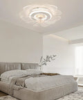Ceiling Fan with Light 18.5 Inch Smart Control Acrylic for Bedroom Living, modern design above a bed in a minimalist bedroom.