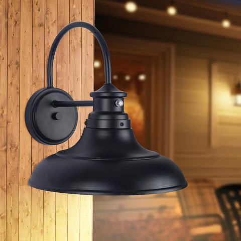 Two Pack Dusk To Dawn LED Outdoor Barn Lights With Gooseneck Wall Mounts, close-up on black fixture against wooden wall