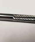 Close-up of One Fourth Inch Cylinder Double Cut Solid Carbide Burr SA-1L For Metalworking And Jewelry Making on a white background.