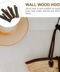 Straight Up Solid Natural Wood Wall Hooks For Bags And Hats Vintage Branch Coat Rack Entryway Storage with brown hat and bag.