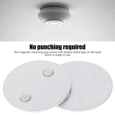 Hella Secure Magnetic Base For Smoke Detectors Drill Free Mounting Pads showing two heavy-duty magnetic pads with adhesive back for easy installation.