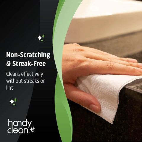 Handy Clean lens cleaning wipes, white disposable wipe held by hand for cleaning glasses or screens