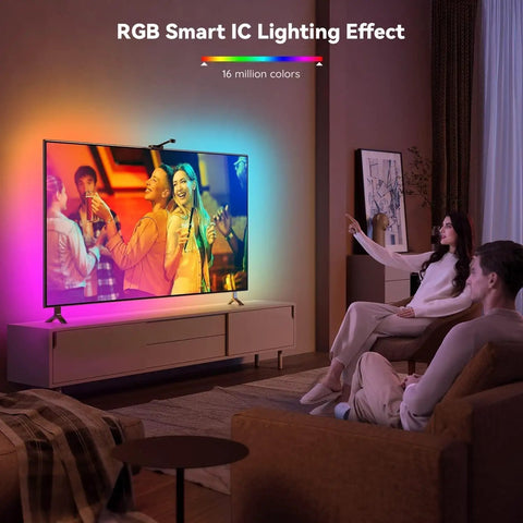 Living room with a TV displaying RGBIC LED TV Backlight Strip For 55 To 65 Inch TVs With Screen Sync And Music Control.
