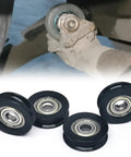 4-Pack Black PU U-Groove Roller Bearings 24mm OD Pulley Wheels 5mm Bore set displayed from above with smooth finish and steel cores.