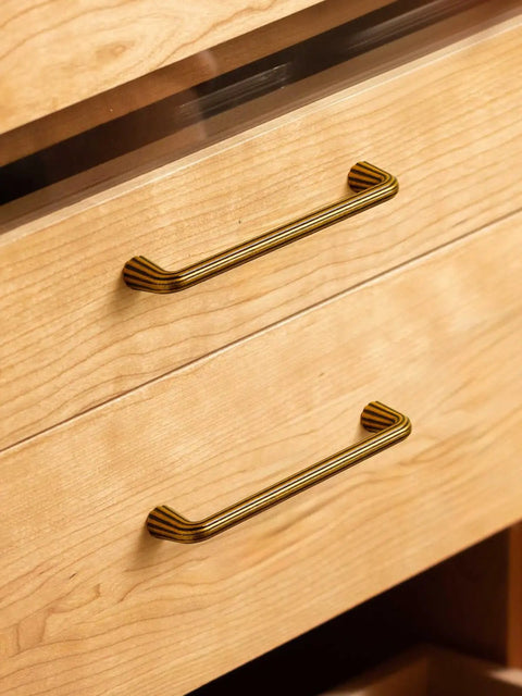 10 Pack Vintage Antique Brass Cabinet Pulls With An Exact 5 Inch Hole Center Solid Zinc Alloy Drawer Handles on wooden drawers.