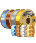 Top Shelf Silk PLA Filament 1.75mm 3D Printer Spool alongside colorful geometric printed vases for art creations.