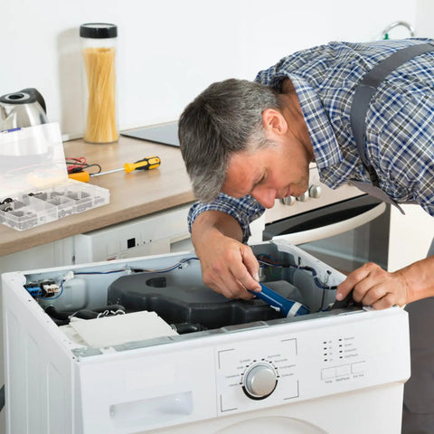 Technician using Internal Tooth Lock Washers Push On Quick Clips Black 340 Piece Assortment Kit on appliance repair