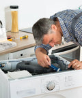 Man repairing appliance using Internal Tooth Lock Washers Set, 340 Pcs Black Assortment Kit, 7 Sizes, visible on table