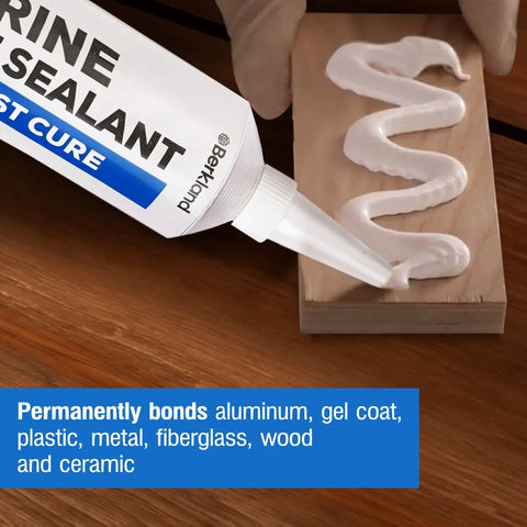 Fast Cure White Marine Adhesive Sealant 5200 For Above And Below Waterline being applied to wood surface