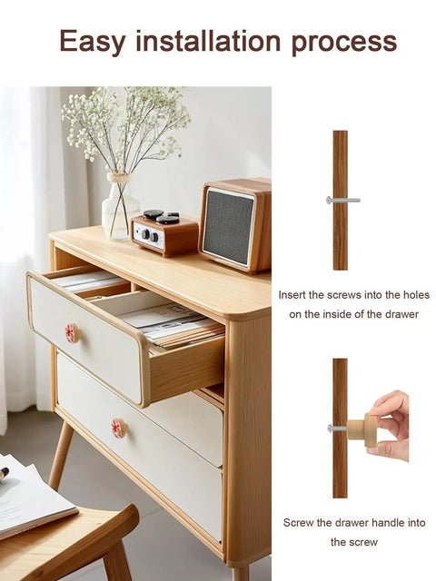 Image showing easy installation for Kickass Red Floral Wooden Cabinet Knobs Solid Beech Drawer Handles One Point Four Inch Round Kitchen Cupboard Pulls.