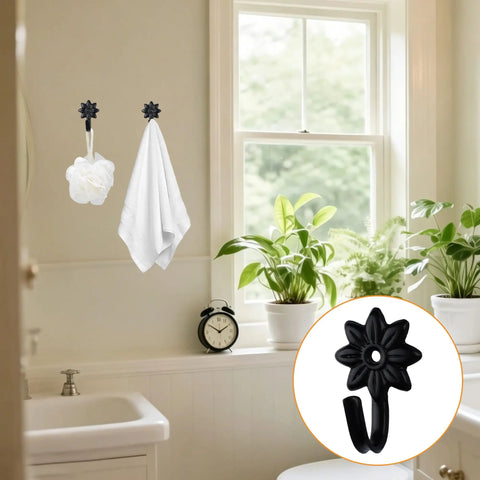Heavy Duty Retro Flower Wall Hooks Eight Pack Slick Vintage Decorative Hardware Holds Up A Ton in a bathroom with towels.