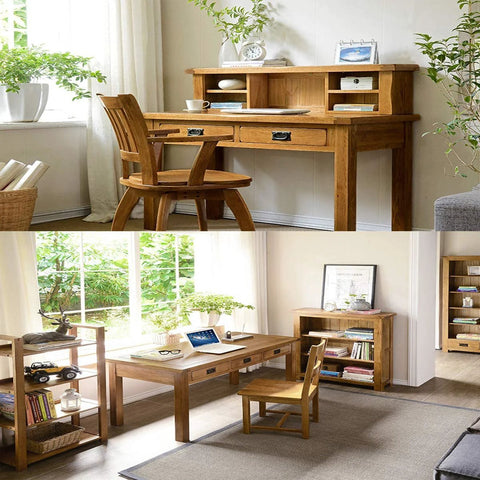 Wooden desk and chair set in home office with greenery and decor items, showcasing Antique Black Ring Pull Handles Set Of 4.