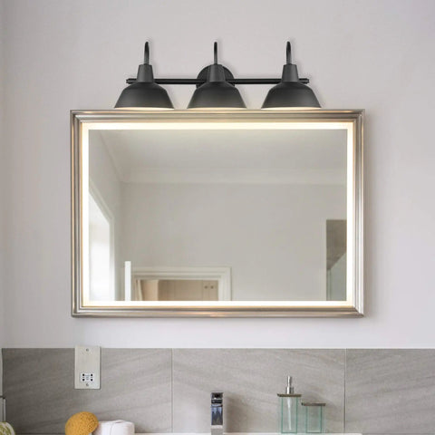 24 inch three light vanity fixture E26 base above mirror in bathroom from the Five Piece Matte Black Bathroom Accessory Set.