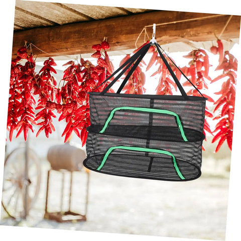 Top Shelf Hanging Drying Rack With Breathable Mesh Net For Herbs Vegetables And Fish No Fuss Space Saving Stand showcasing red peppers.