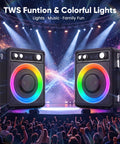 All In One Karaoke System With Two Wireless Microphones Portable Bluetooth Speaker with colorful lights on stage