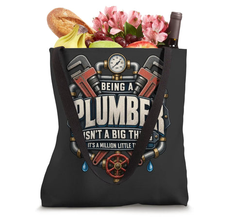 Rad Knucklebuster Plumber Shirt for Pipefitters and Plumbers Being a Plumber Is Not a Big Thing Its a Million Little Things Funny Trade Grind Dad Tee Gift for Handymen Valve Experts with Tote Bag filled with fruits and flowers.