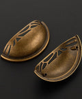 Two Three Pack Antique Brass Half Moon Cup Pulls For Kitchen Cabinets And Drawers Featuring Hella Smooth Finishes and detailed cuts.