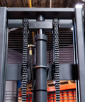 Heavy Duty Fully Electric Adjustable Straddle Stacker Delivers Solid 3300 Pound Capacity And Snappy 11 Foot 6 Inch Lift close-up of hydraulic system and chains.