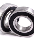 Straight Up Tough C3 Spindle Rebuild Bearings 2 Pack For John Deere Tractors showing precision bearings with black seals.