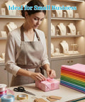 330 Sheets Multicolor Tissue Paper Pack 14x10 Inches Wrapping Paper For Gift Bags on a table in a small business.