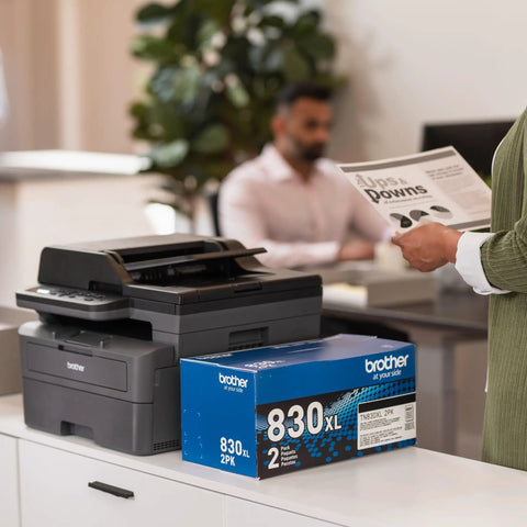 Compact Monochrome 3 In 1 Laser Printer With Copy Scan And Auto Duplex Wireless And Mobile Printing Alexa Compatible No Fuss Small Biz Workhorse For Home Office Use Includes Refresh Trial on office desk.