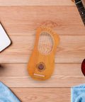 7 String Lyre Harp Starter Kit With Tuning Wrench Extra Strings And Music Sheet Book on wooden background