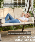 Woman relaxing on Three Seat Patio Swing Chair With Adjustable Canopy Cozy Outdoor Porch Swing Glider with pillows and cushions
