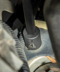 Using 80 Piece 3/8 Inch Drive Master Impact Socket Set With Universal, Star And External Star Sockets on automotive part.