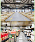 Premium Led Linear High Bay Light Packing Kickin Sixty Thousand Lumens Of Rock Solid Commercial Shop Illumination For Warehouses And Garages Featuring Adjustable Wattage Levels And Tough ETL Industrial Build Quality in a spacious warehouse with boxes.