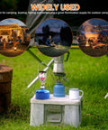 Go To Portable Camping Lantern With Adjustable Brightness And Warm Glow on grass beside camp stove and cup