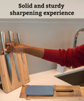Sink Mounted Whetstone Holder For Easy Knife Sharpening No Mess Over The Sink, Warm Acacia Wood, shown on kitchen counter