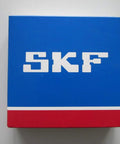 Heavy Duty Spherical Roller Bearings Featuring Self Aligning Design And Rock Solid Construction packaging by SKF.