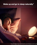 Person using Smart Portable Dimmable Table Lamp For Indoor And Outdoor Use With Color Changing LED Ambiance IP54 on bedside table.