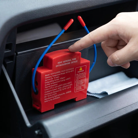 Aerosol Fire Extinguisher for Cars Automatic Self Adhesive Peel and Stick Vehicle Safety Gear in a car glove box.