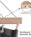 Close-up of hardwood spreader bar with countersunk holes on Two Person Hammock With Stand Heavy Duty Portable Hammock Supports Up To 475 Lbs Fade Resistant Quilted Polyester For Outdoor Camping And Backyard Chill Sessions Dark Grey.