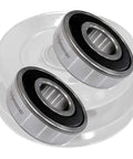Top Shelf Double Stack Pulley Bearings Two Pack With C3 Precision Balls And Synthetic Grease For Badass Heat Resistance And Smooth Operation On Heavy Duty Farm Gear close-up of two sealed precision bearings.
