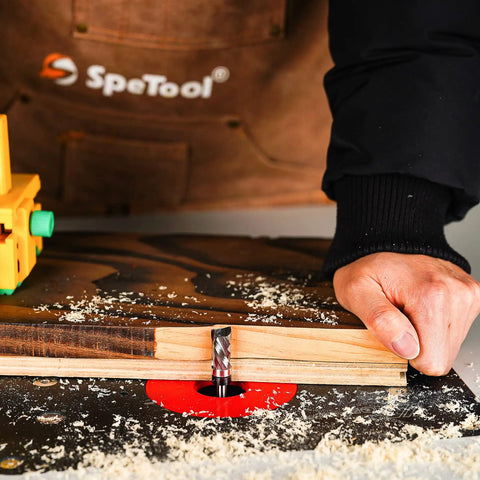 Craftsman using Top Bearing Compression Flush Trim Router Bit with half-inch cutting diameter on wood template for clean trimming