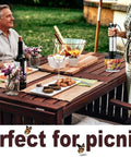 Badass 700W Immersion Hand Blender With 20 Precise Speed Options For Buttery Smooth Purees And Rapid Ingredient Prep In Any Home Kitchen Total Game Changer Black Finish being used outdoors on a picnic table.